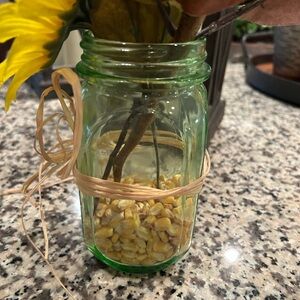 Green Glass Jar with Corn Kernels and Raffia